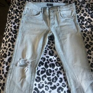 Men's Light Blue Striped Jeans with Distressed Detail